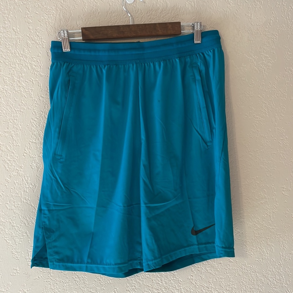 Blue Nike shorts